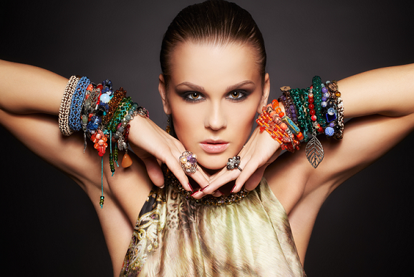 Beautiful woman wearing multiple bracelets.  Are bracelets fun?